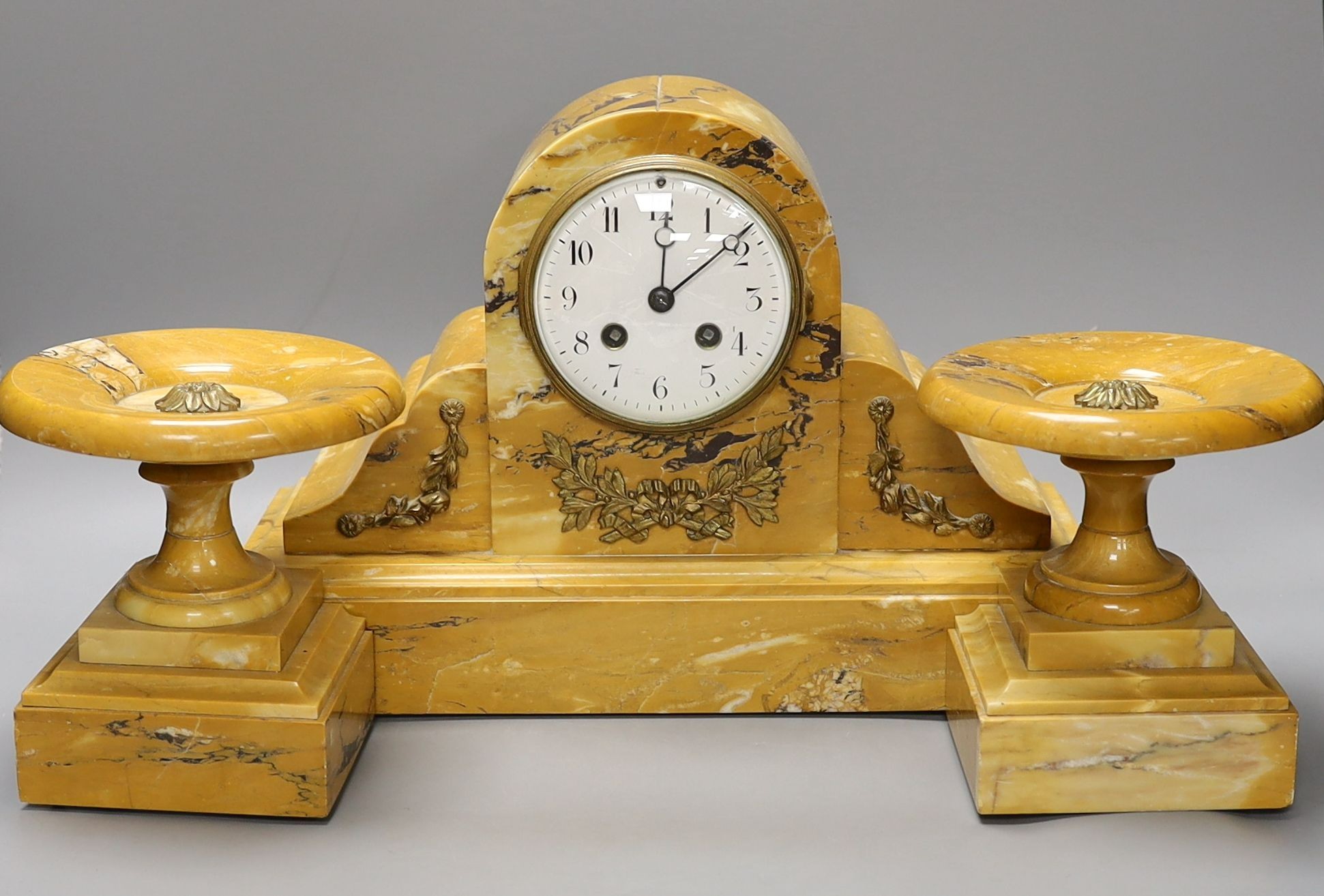 A Sienna marble clock with a pair of garnitures (3)